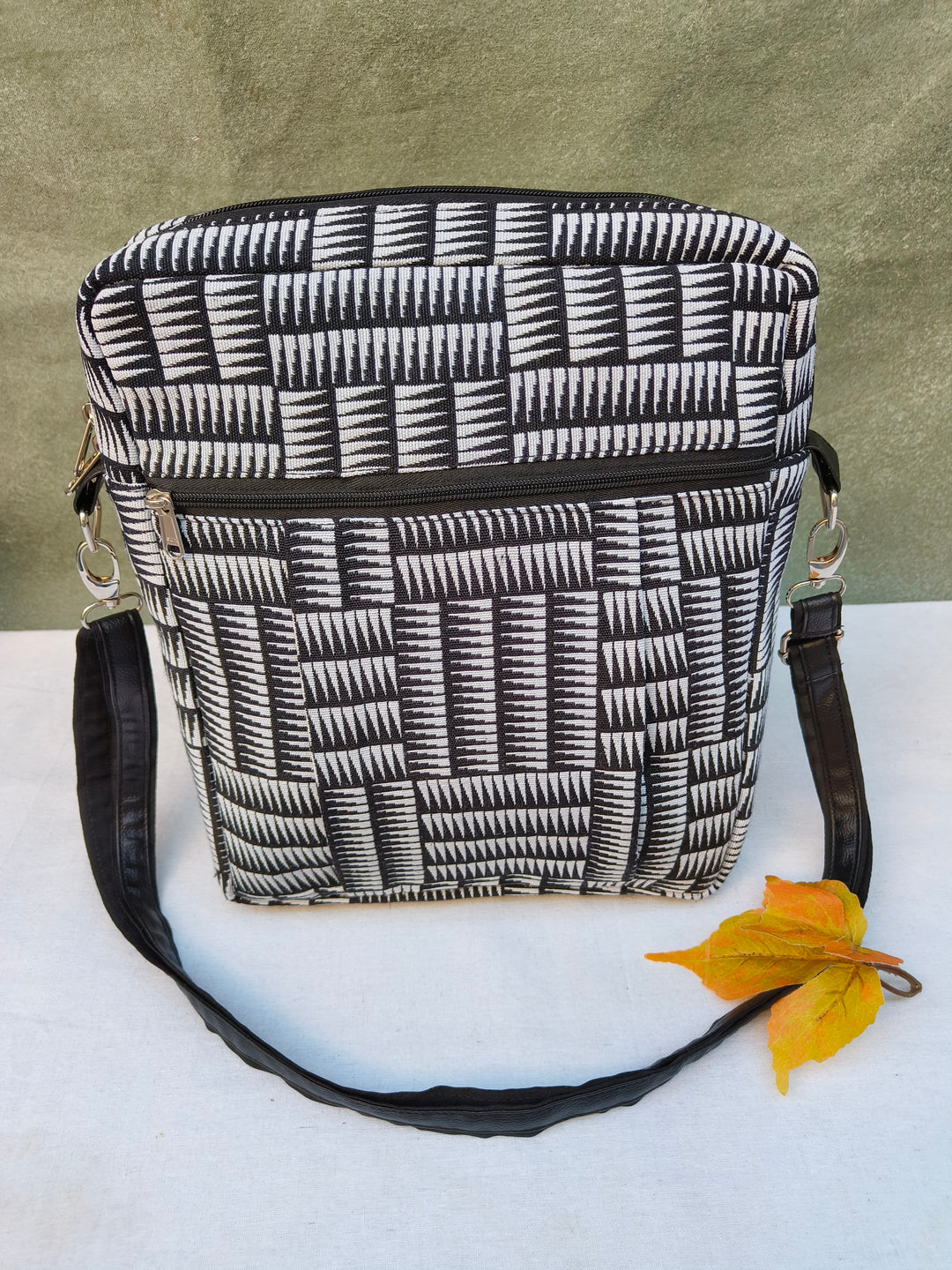 Lap sling cum backpack Black with white strip print