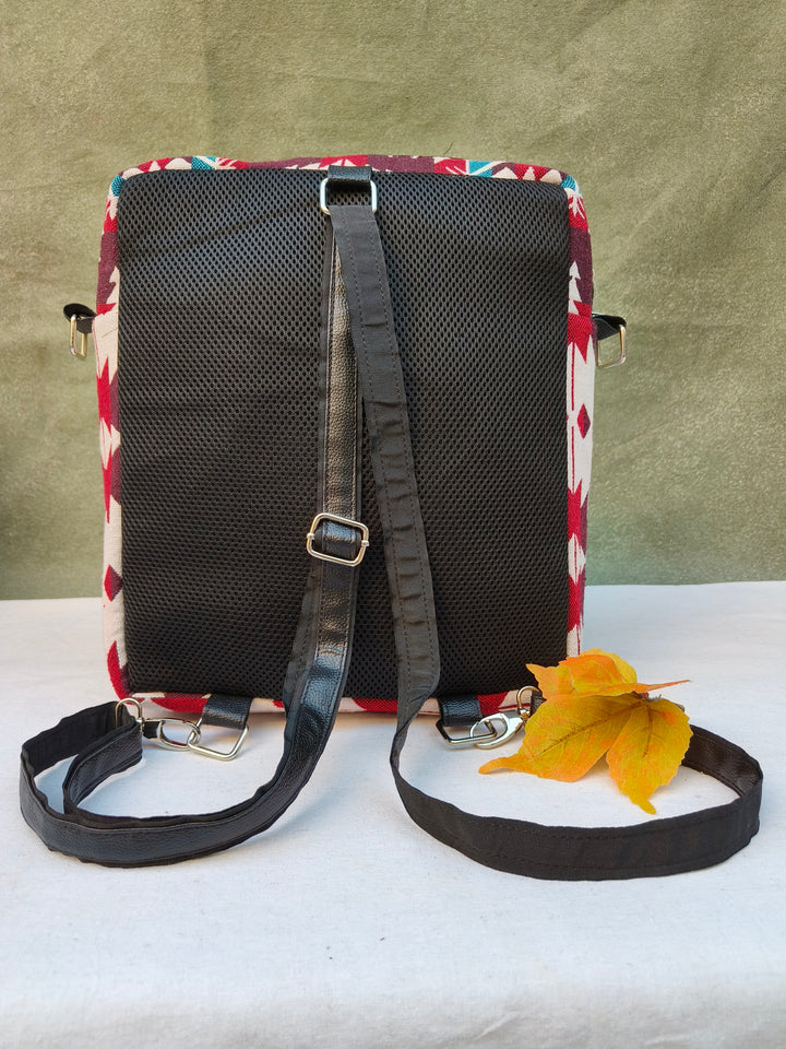 Lap sling cum backpack white with red Tribal Arrow