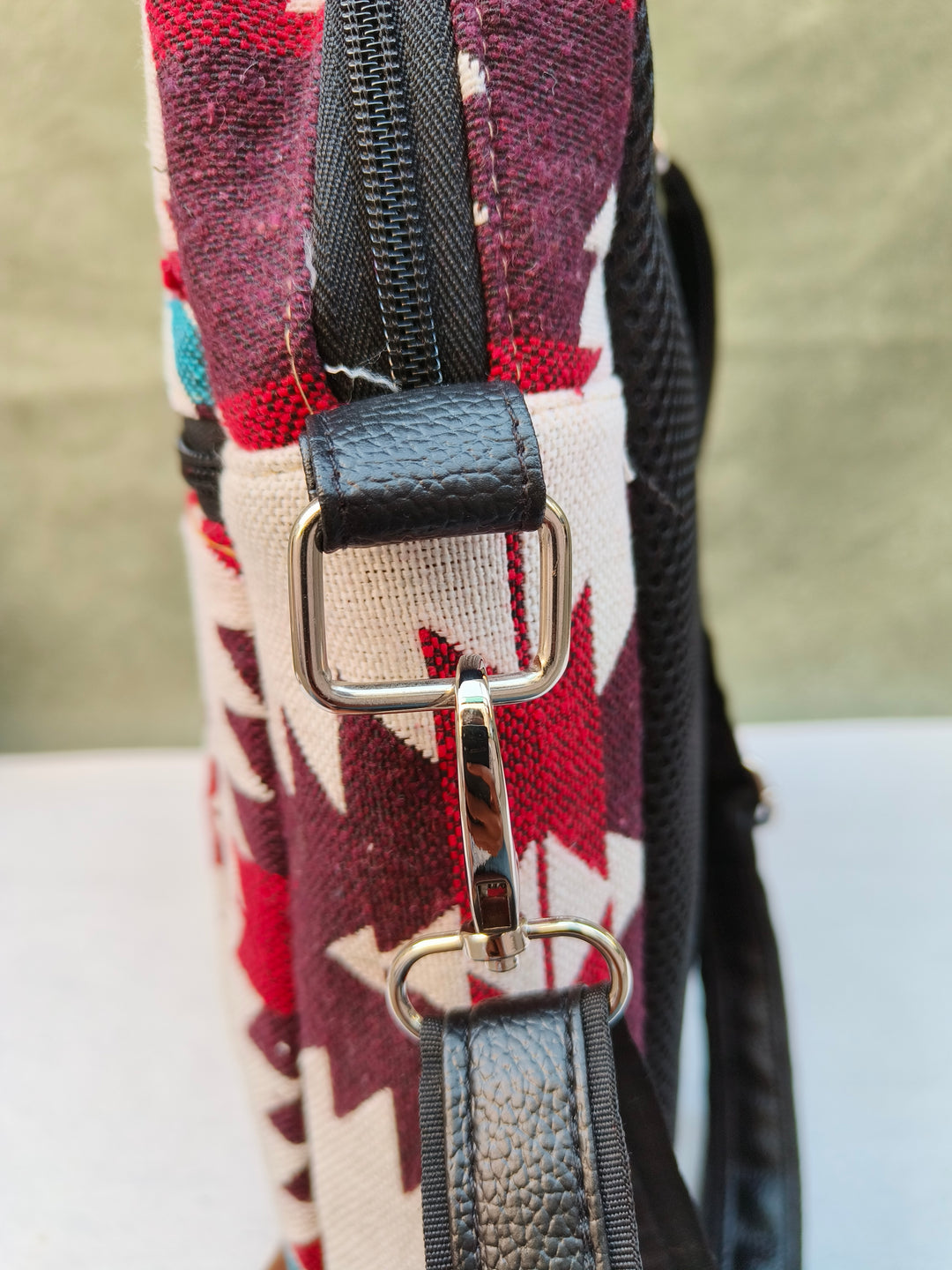 Lap sling cum backpack white with red Tribal Arrow