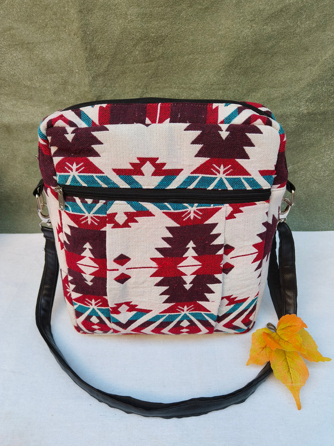 Lap sling cum backpack white with red Tribal Arrow