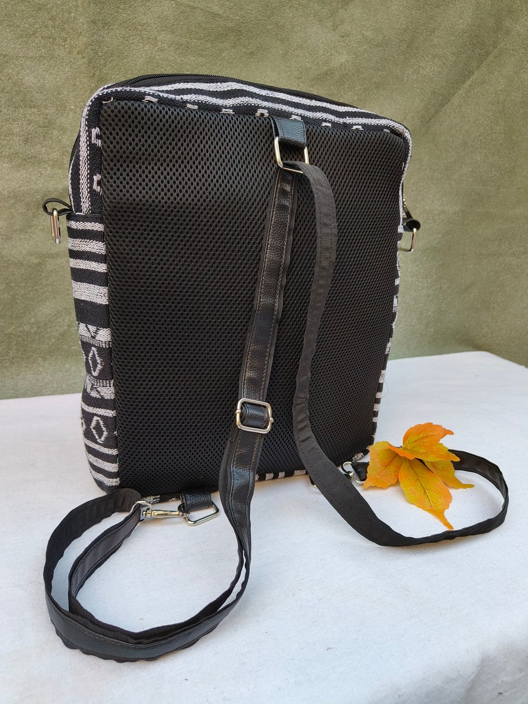 Lap sling cum backpack Black with white diamond lines print
