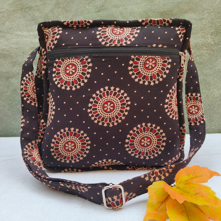 Xtra Sling bag black With Circle Flower Print