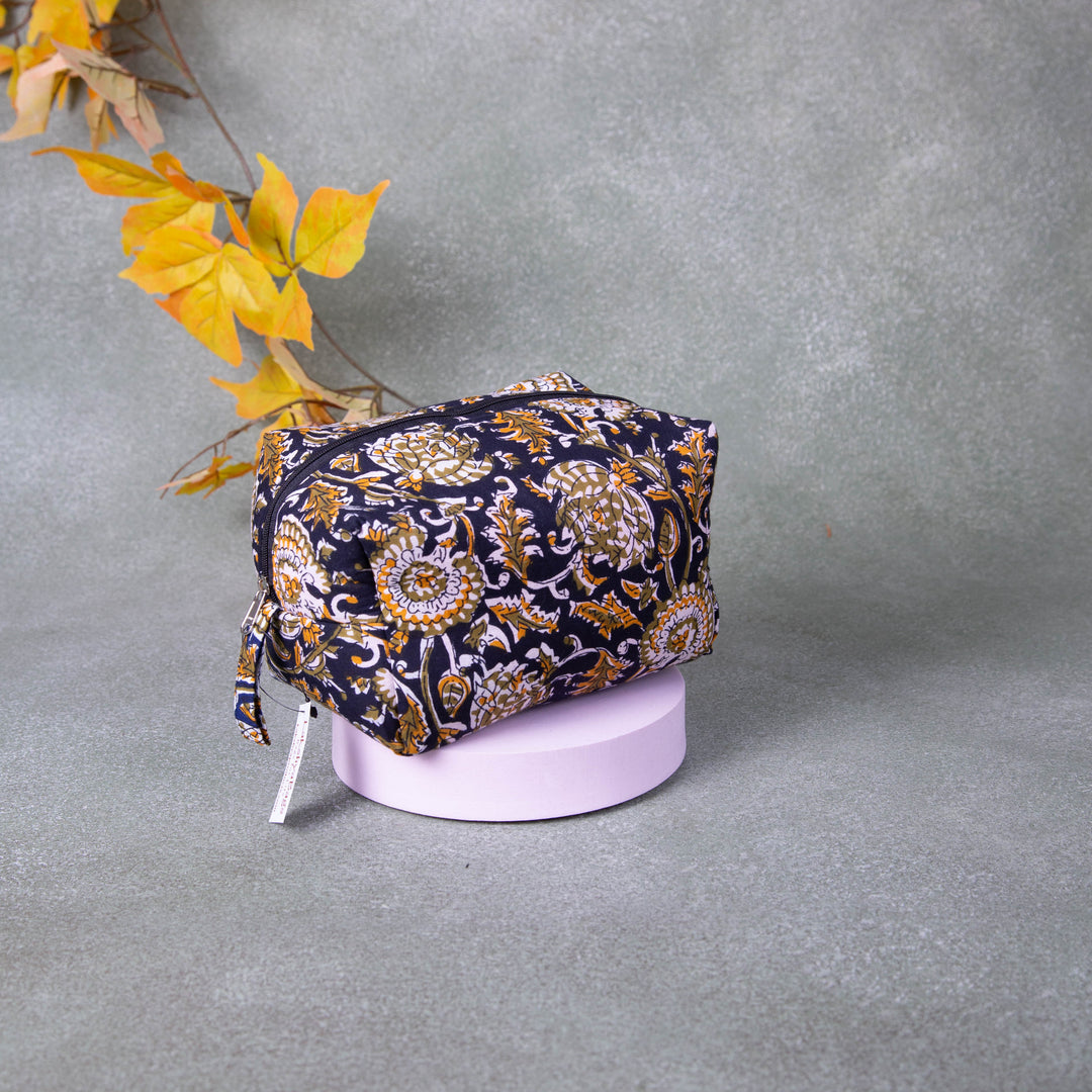 Vanity Pouch Black Colour with Mustered Prints.