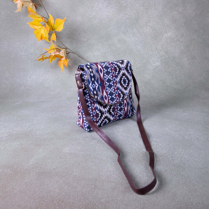 Regular Slings Blue with Maroon Colour Round Flap Design.