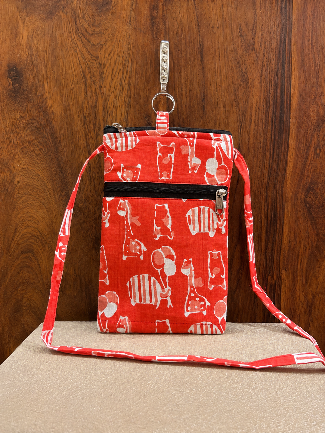 Mobile Sling -  Red color with animal printed (With Saree Clip)