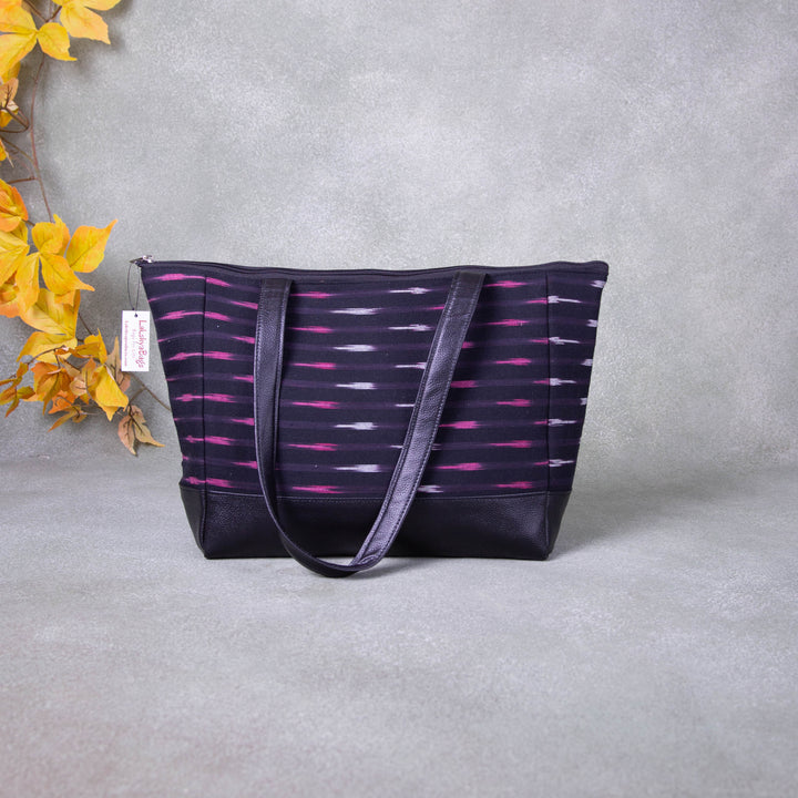 Sarus Crane Series Jumbo Tote Black Colour with Pink Horizontal Prints.