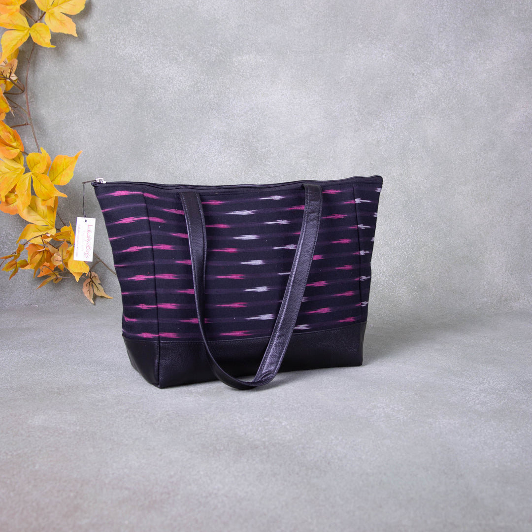 Sarus Crane Series Jumbo Tote Black Colour with Pink Horizontal Prints.