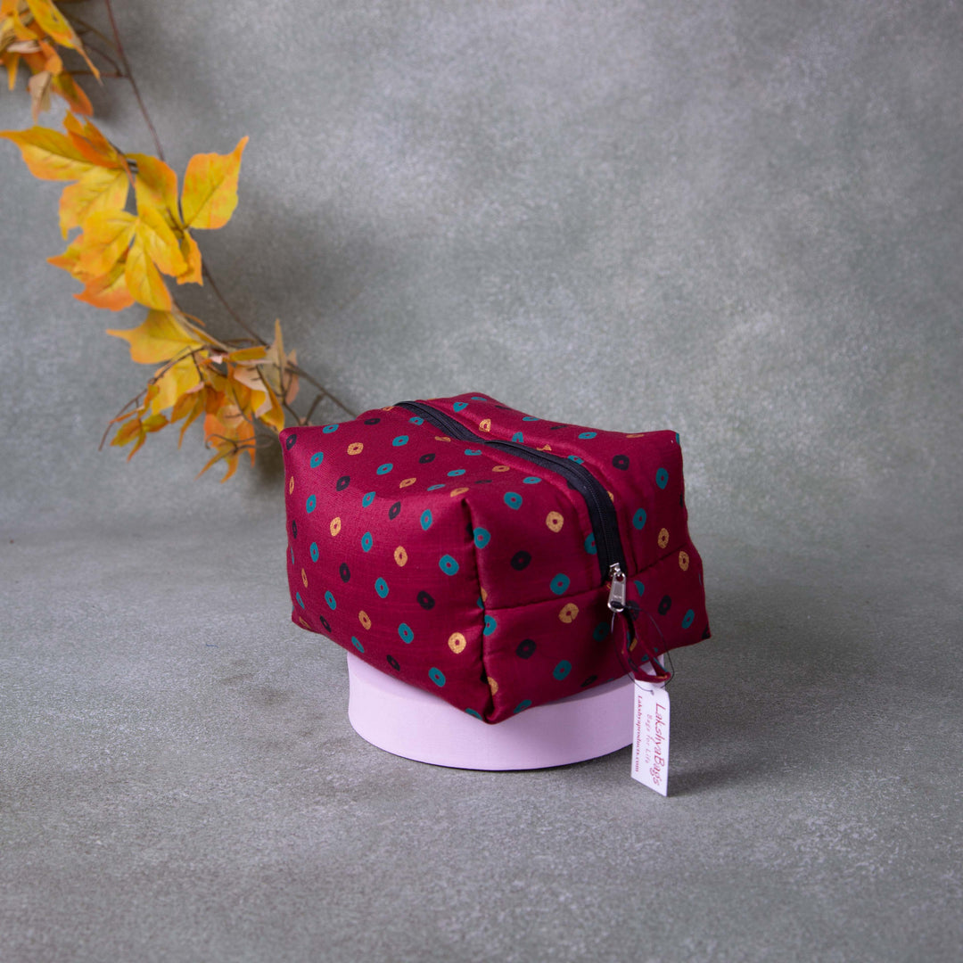 Vanity Pouch Maroon Colour with Green Gold Black Dots Design.