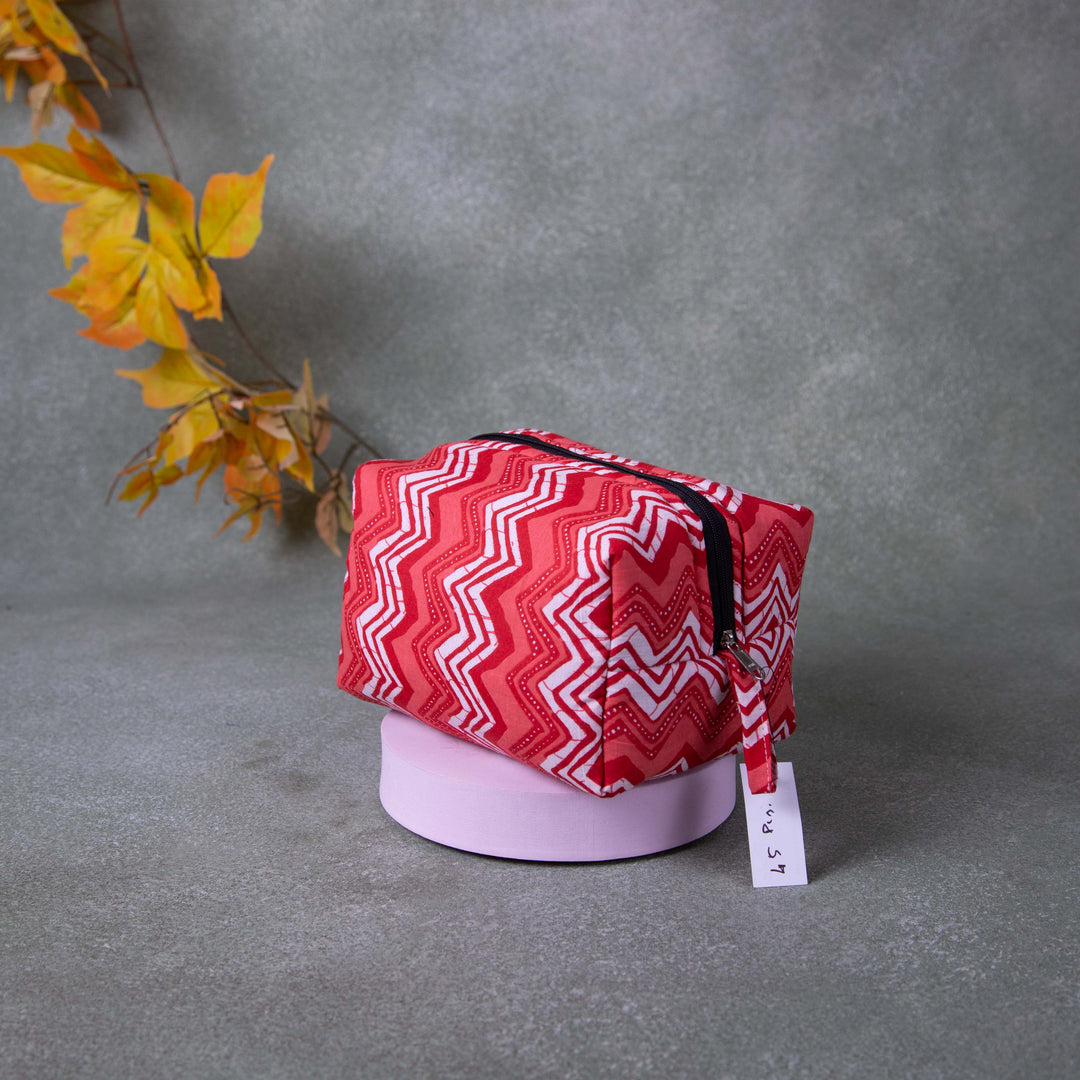 Vanity Pouch Pink Colour with White and Red Zig Zag Design.