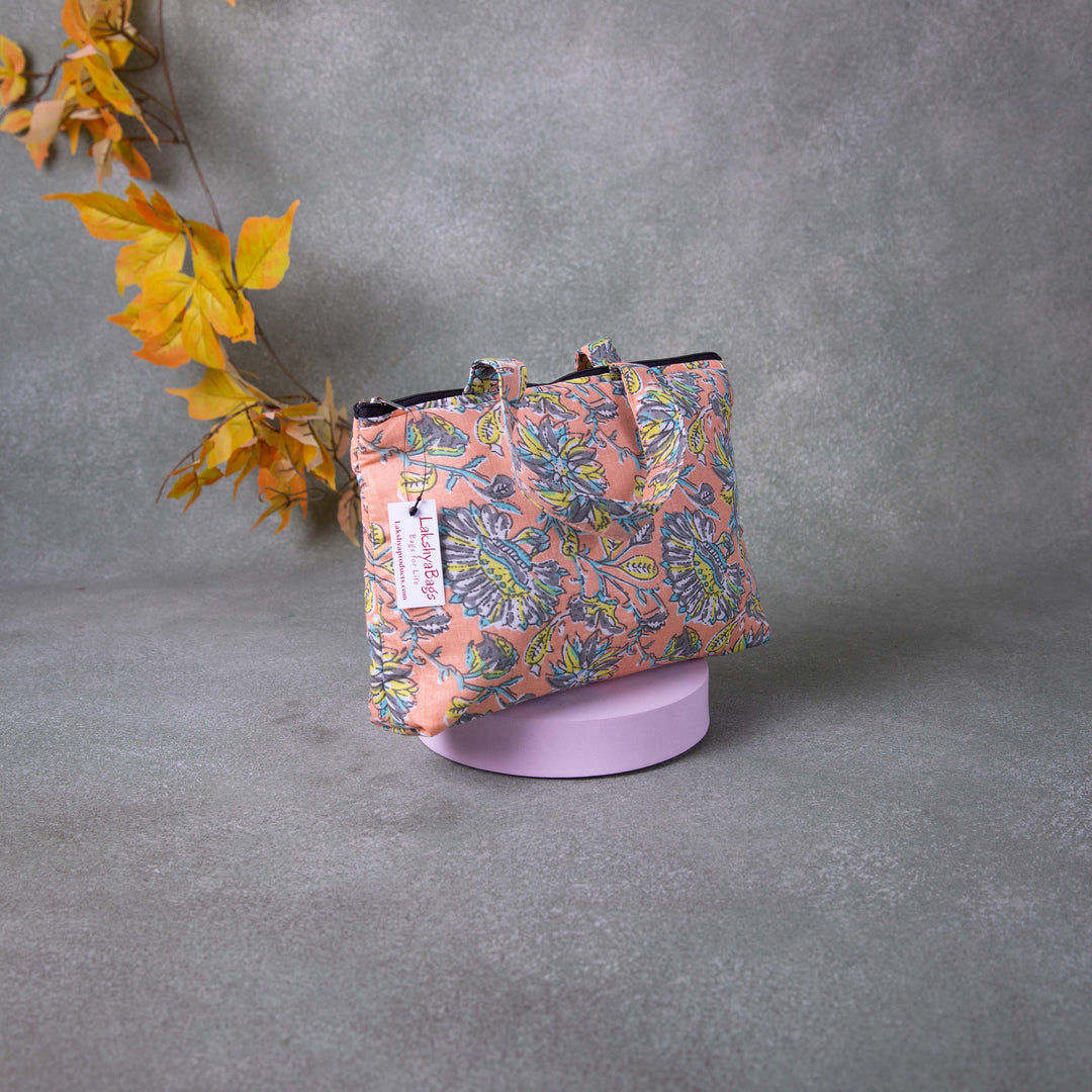 Bristlefront everyday handy bags Peach Colour with Flower Printed Design.