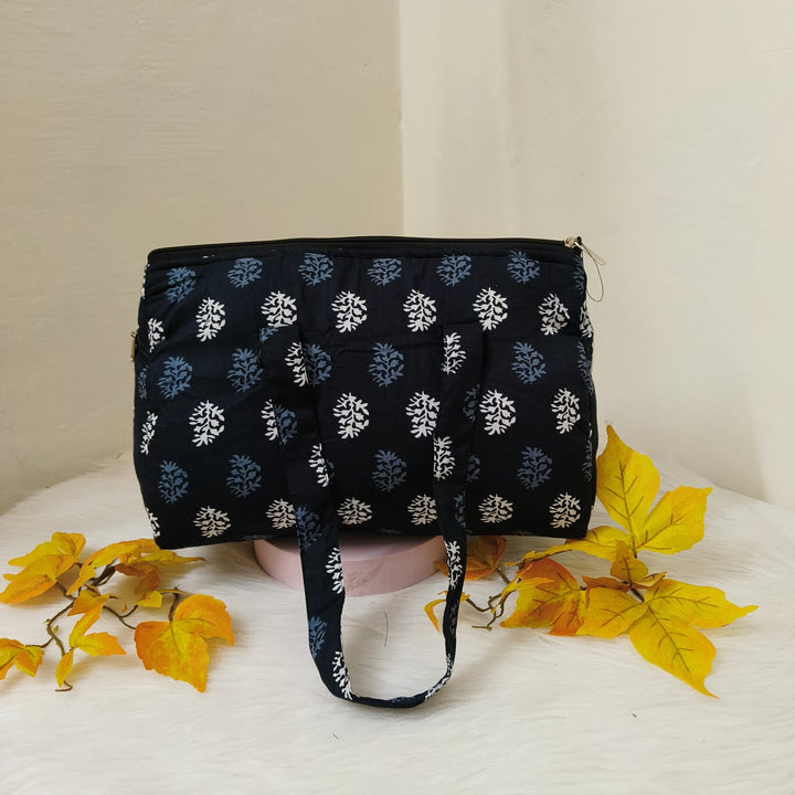 Barrel Handbags Black with White Prints.