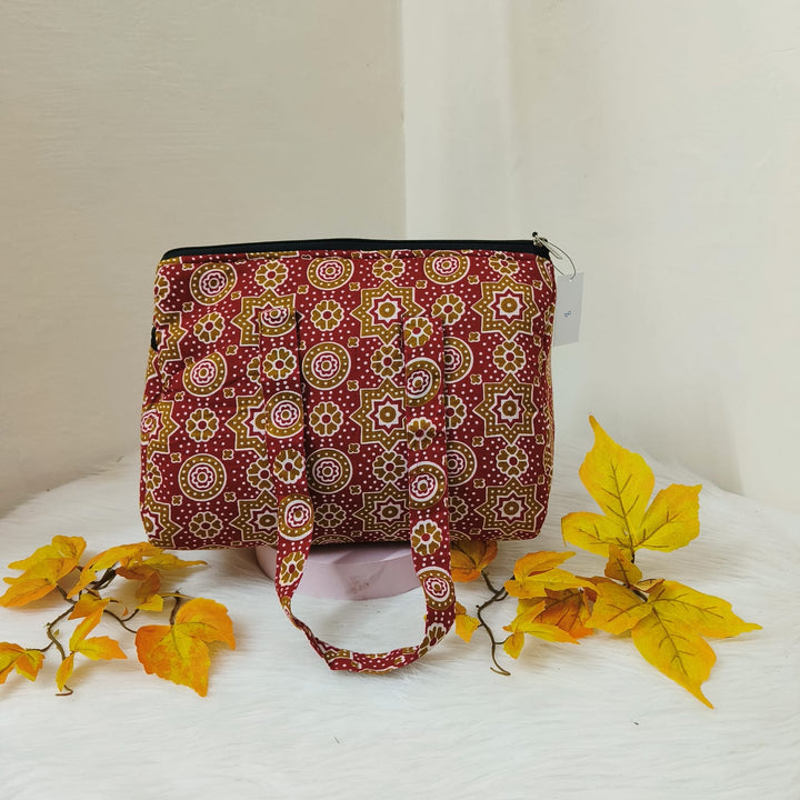 Barrel Handbags Red with Mustered Floral Design.