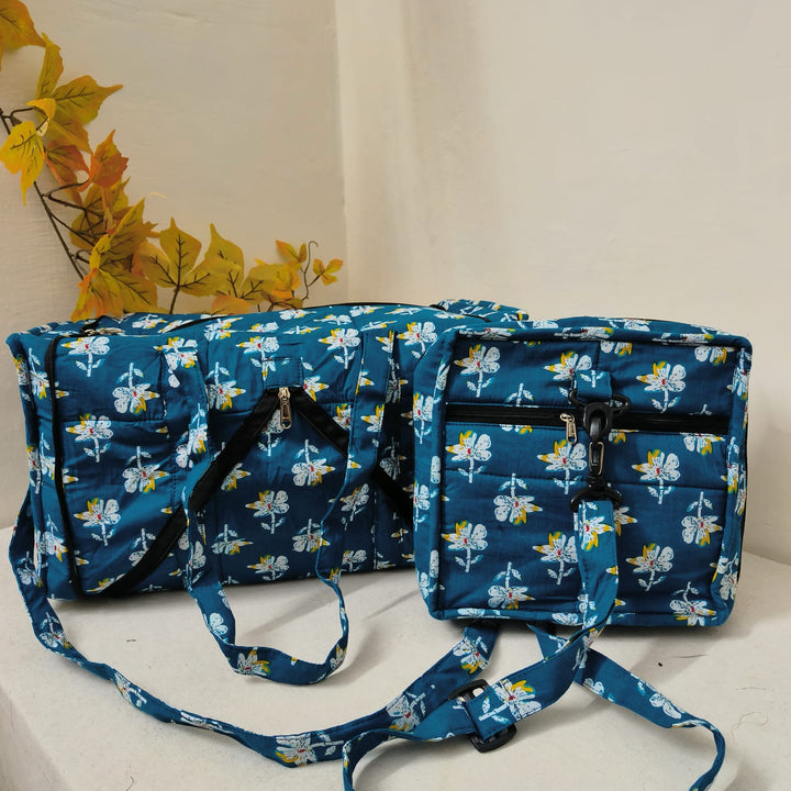 Expandable Travel Bag Blue With Yellow and White Floral Design.