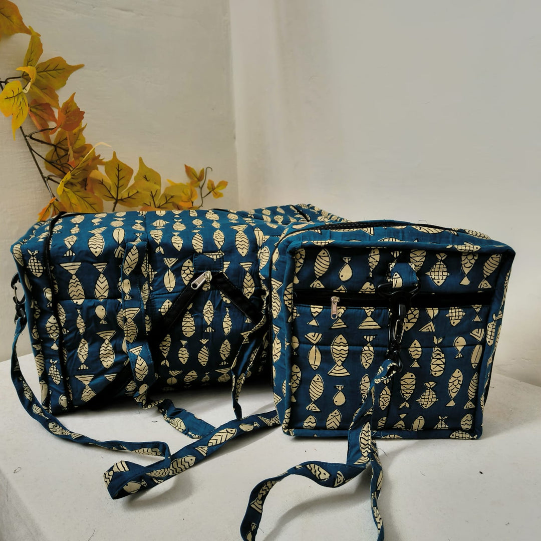 Expandable Travel Bag Peacock Blue with Fish Design.