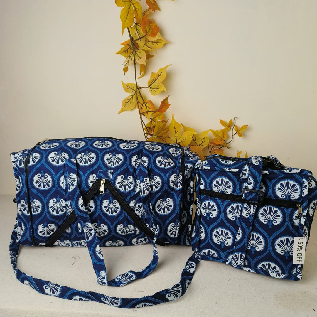 Expandable Travel Bag Blue with White Peacock Design.