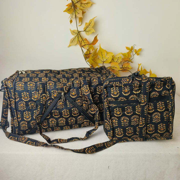 Expandable Travel Bag  Black with Mustered Flower Design.