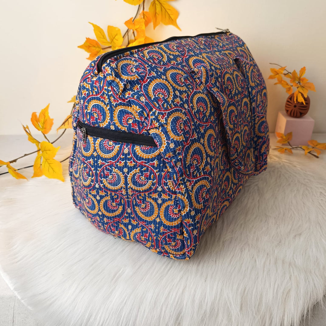 Weekender Travel Bag Blue with Mustered Flower Design.