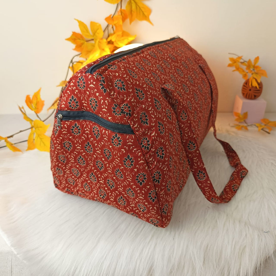 Weekender Travel Bag Red With Black Floral Design.