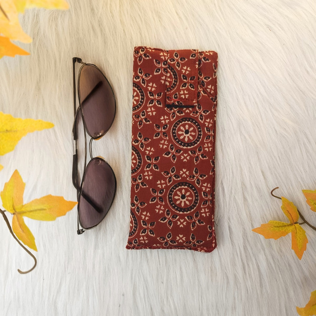 Sunglass Pouch Maroon with Black Floral Design.