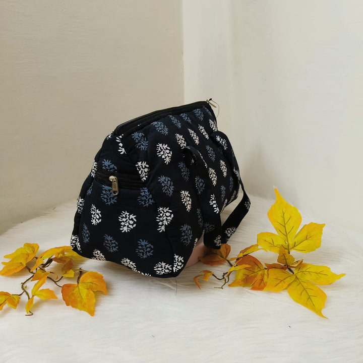 Barrel Handbags Black with White Prints.