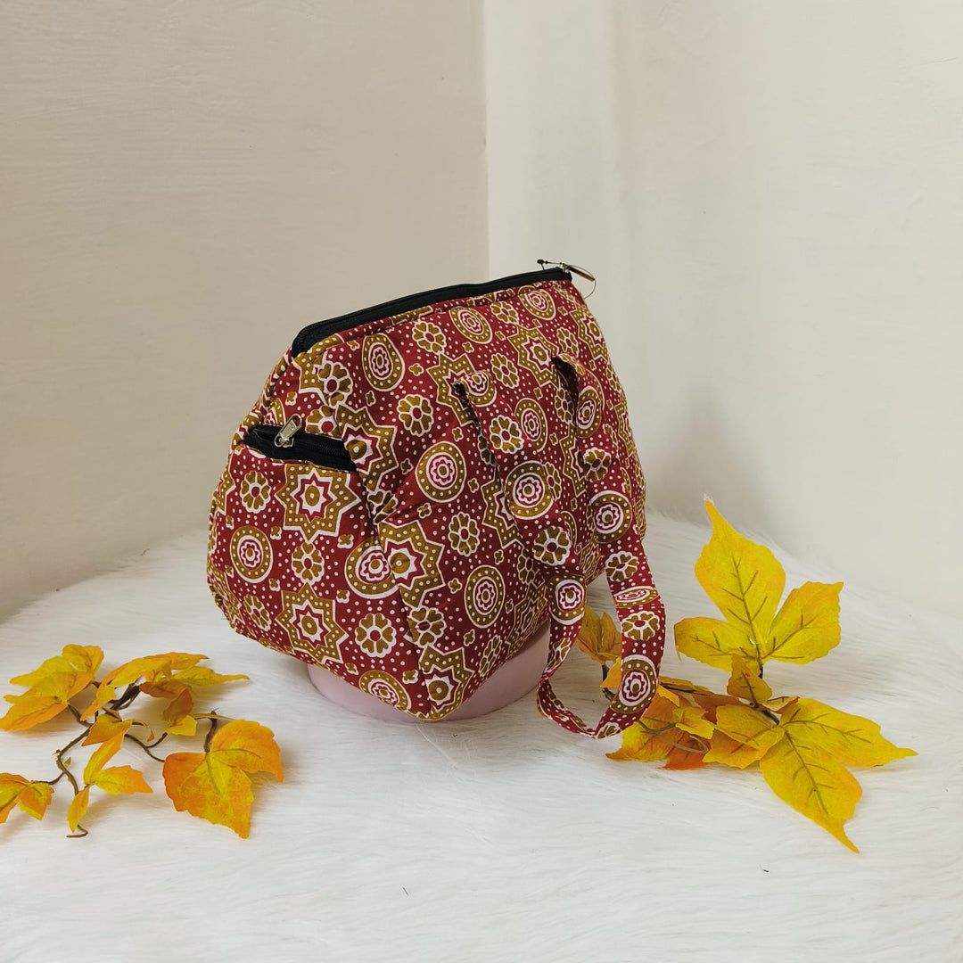 Barrel Handbags Red with Mustered Floral Design.