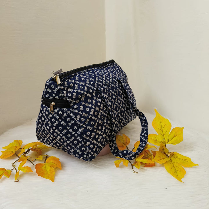 Barrel Handbags Blue with White Arabesque Prints.